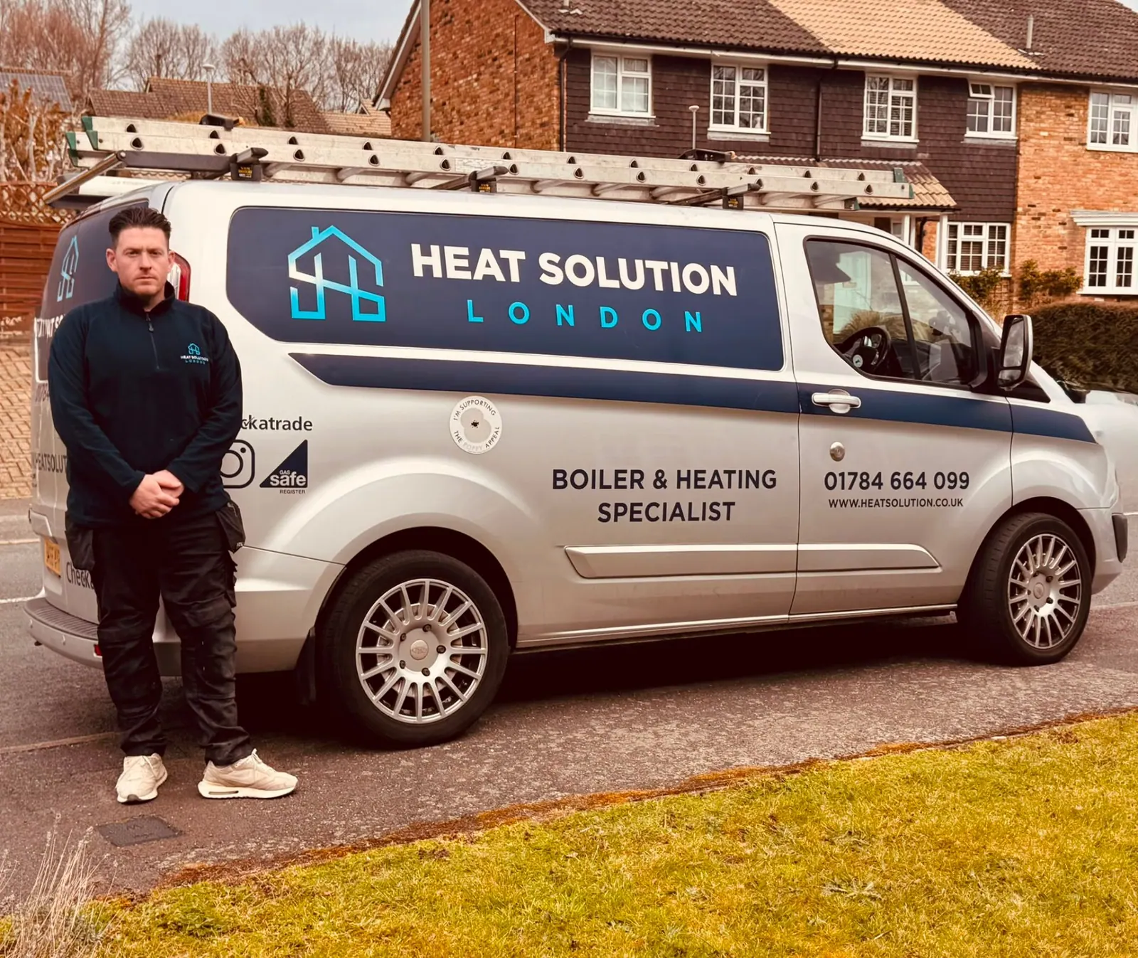 Calvin Newton with the Heat Solution London van